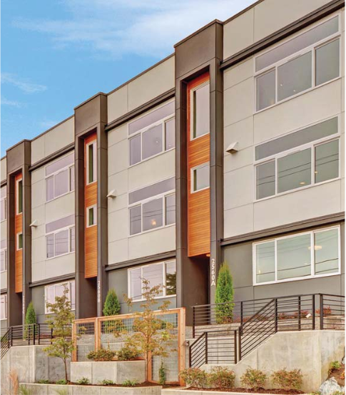 The dark grey represents the ground retail. which is set back to create a more inviting space.