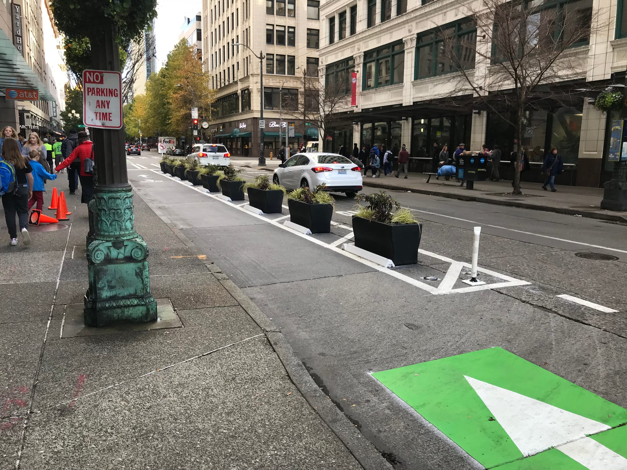 Planter boxes providing separation on Pike Street.
