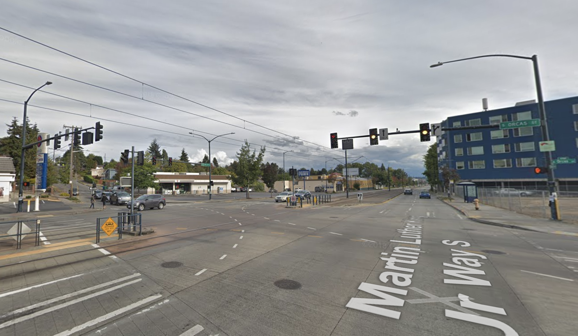 The traffic light at S Orcas St has a warning sign that lights up when trains are approaching. (Google Maps)
