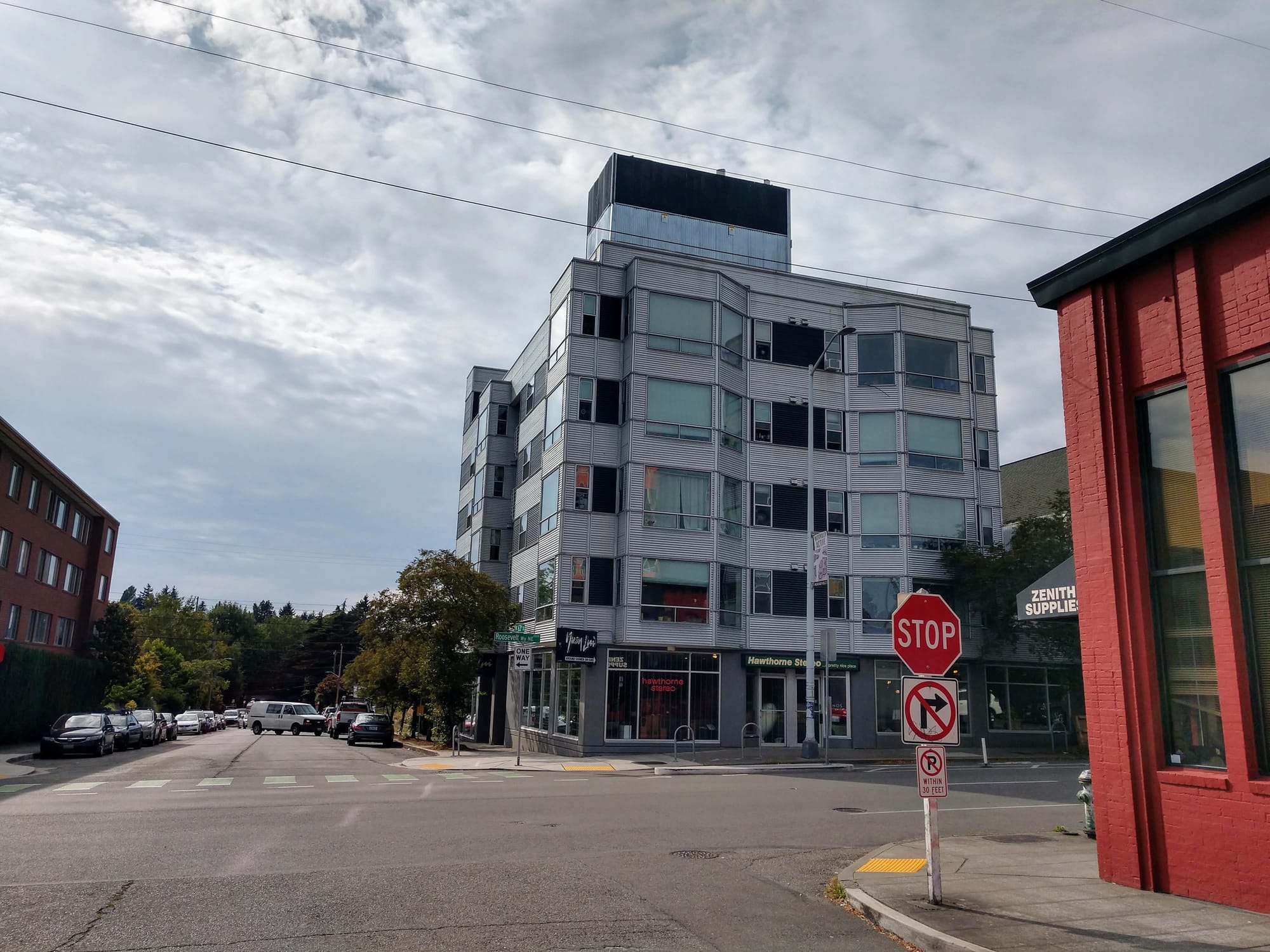 Apartments are going up along Roosevelt Way, and one or two additional stories of height could get more units and with a higher percentage set aside as affordable MHA homes. (Photo by Doug Trumm)