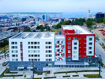 Hoa Mai Gardens, a dense SHA housing development in Yesler Terrace, which also contains space for nonprofits like youth writing organization the Bureau of Fearless Ideas. (Credit: SHA)