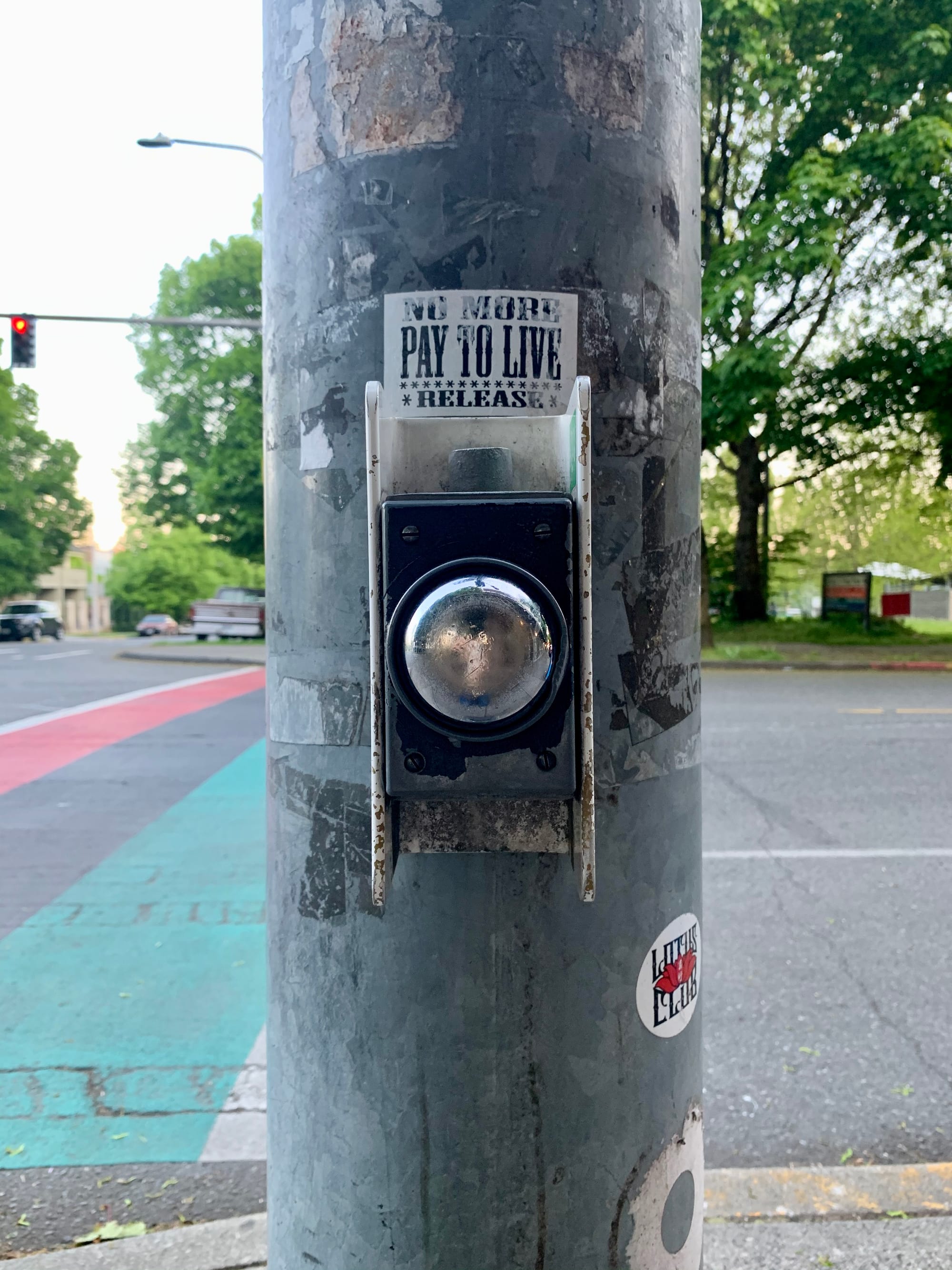 An example of a push button that needs to be activated to trigger the walk signal (aka. beg button) in the Central District. (Photo by author)