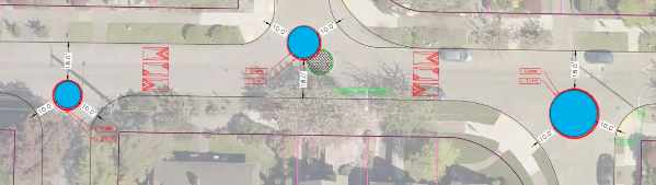 Three traffic circles at intersections where the road forms a T
