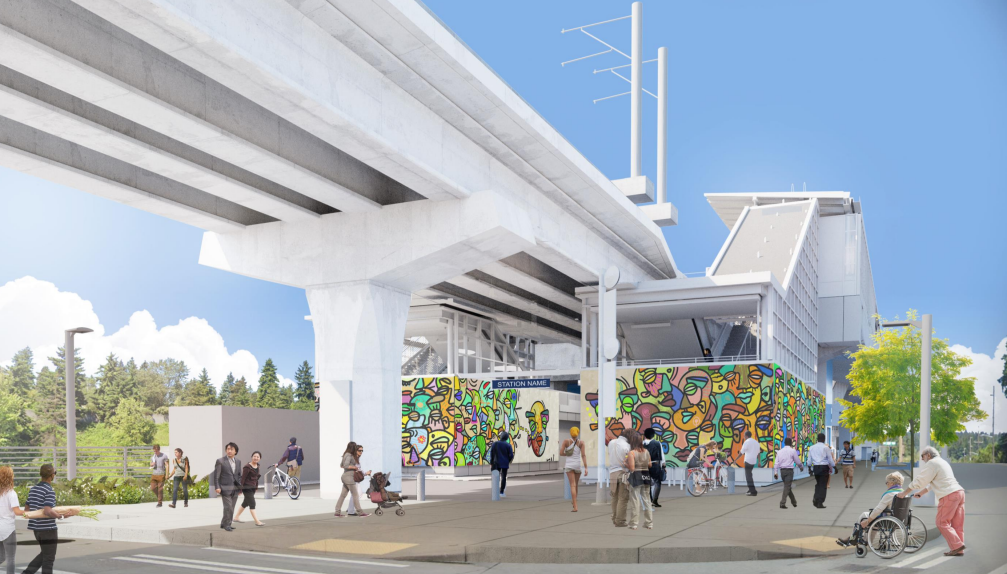 A view of the 130th Street light rail station from the south, with many people walking, biking or using wheelchairs to  access transit
